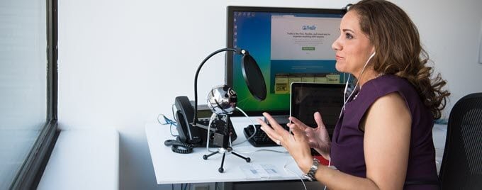 woman-podcasting - Online Tech Tips The Essential Tools To Help You Create a Podcast image 13