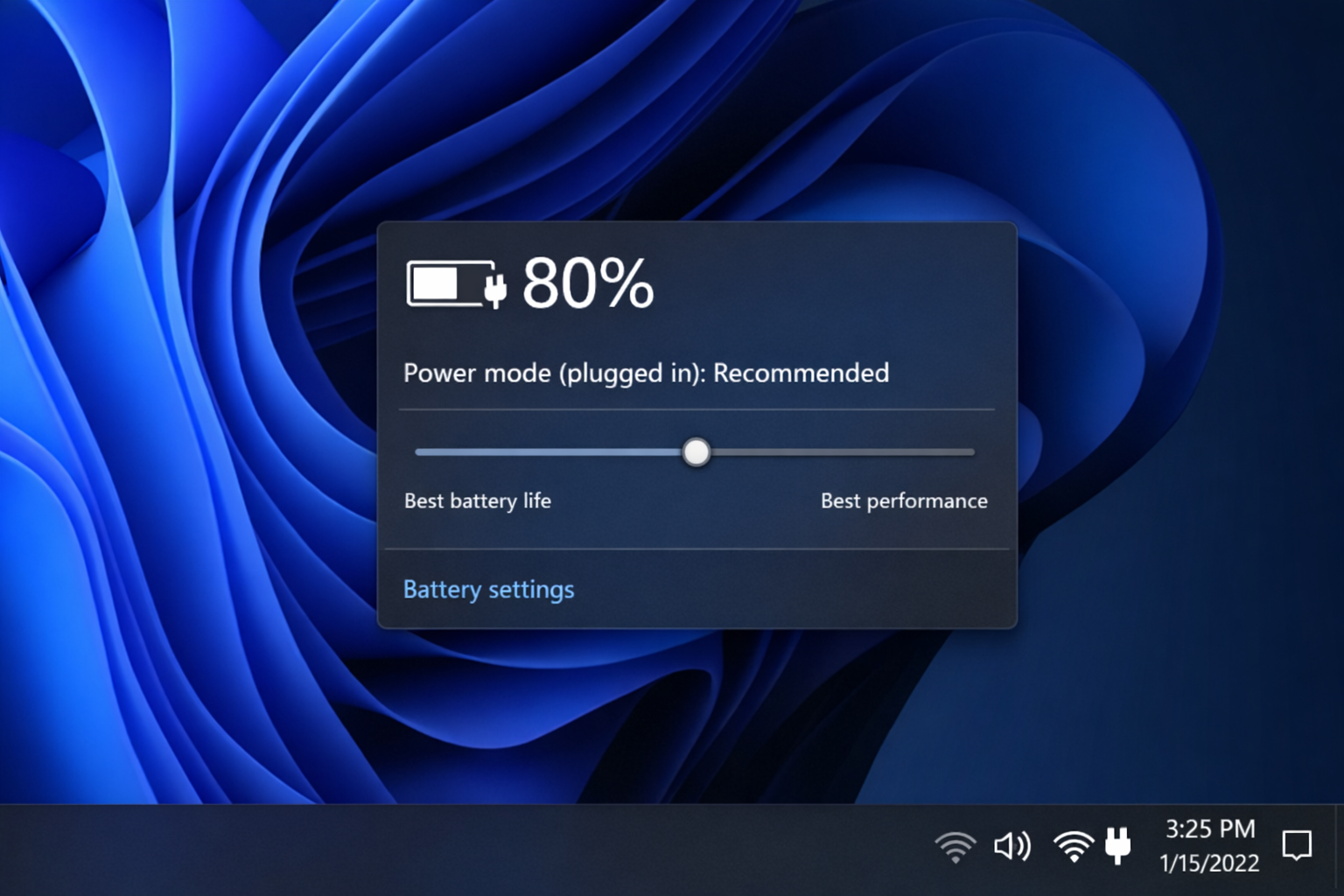 Laptop plugged in showing battery stuck at 80 percent on screen.