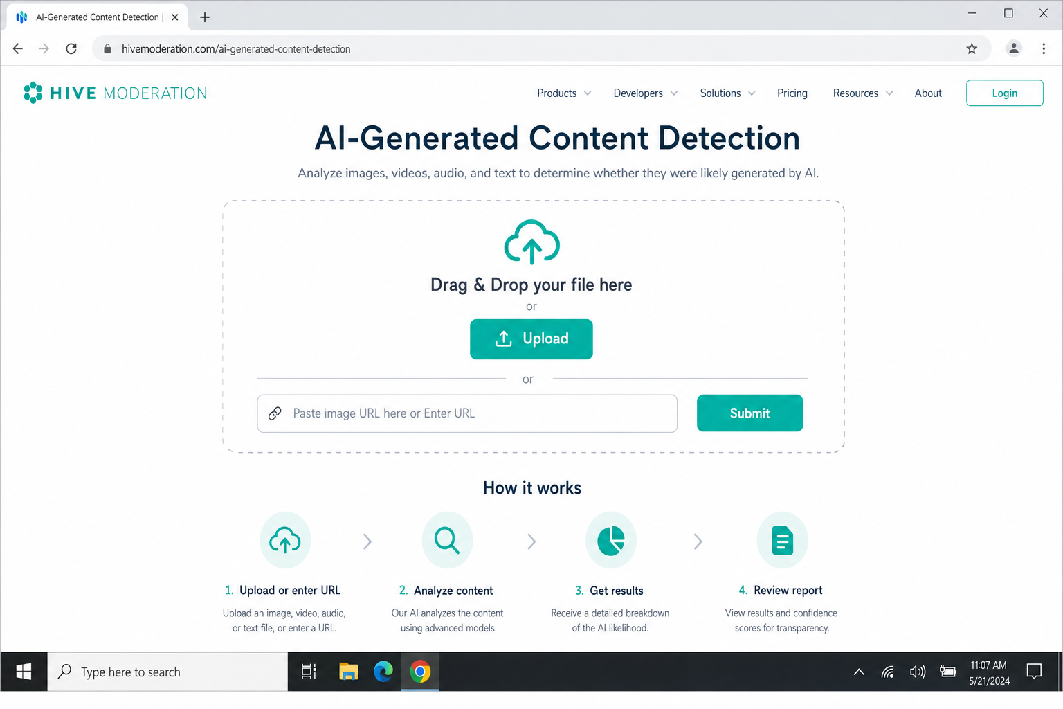 Hive Moderation AI-generated content detection page showing the drag-and-drop upload zone and the URL input field where users submit an image for analysis