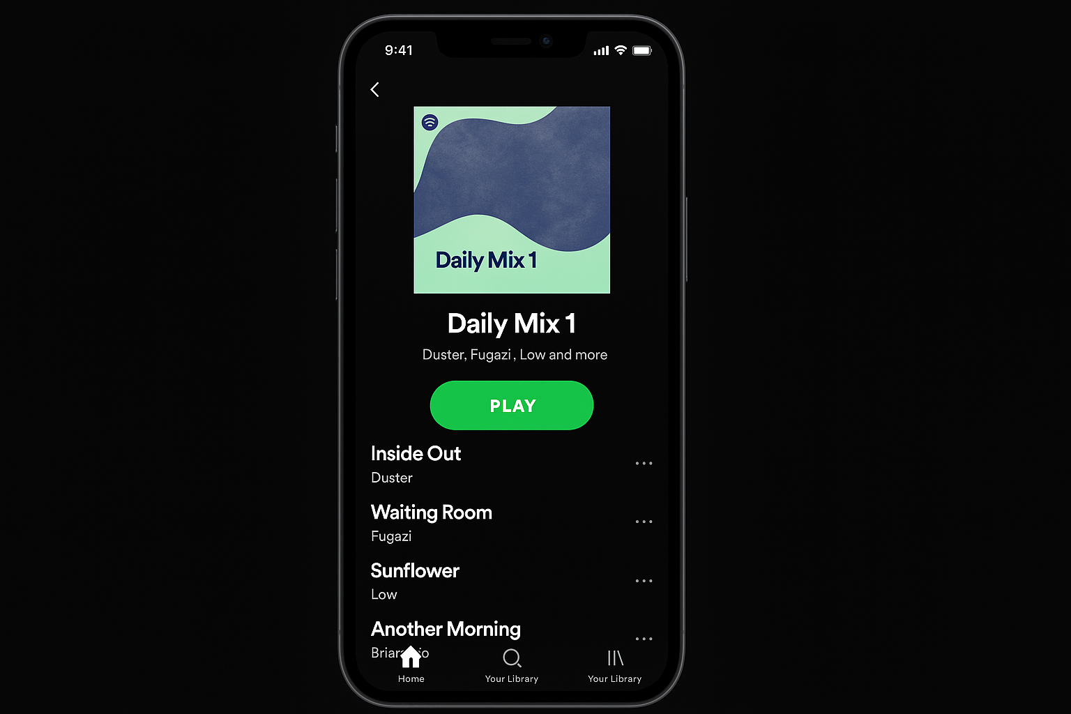 Spotify iOS app showing premium features active with download button visible