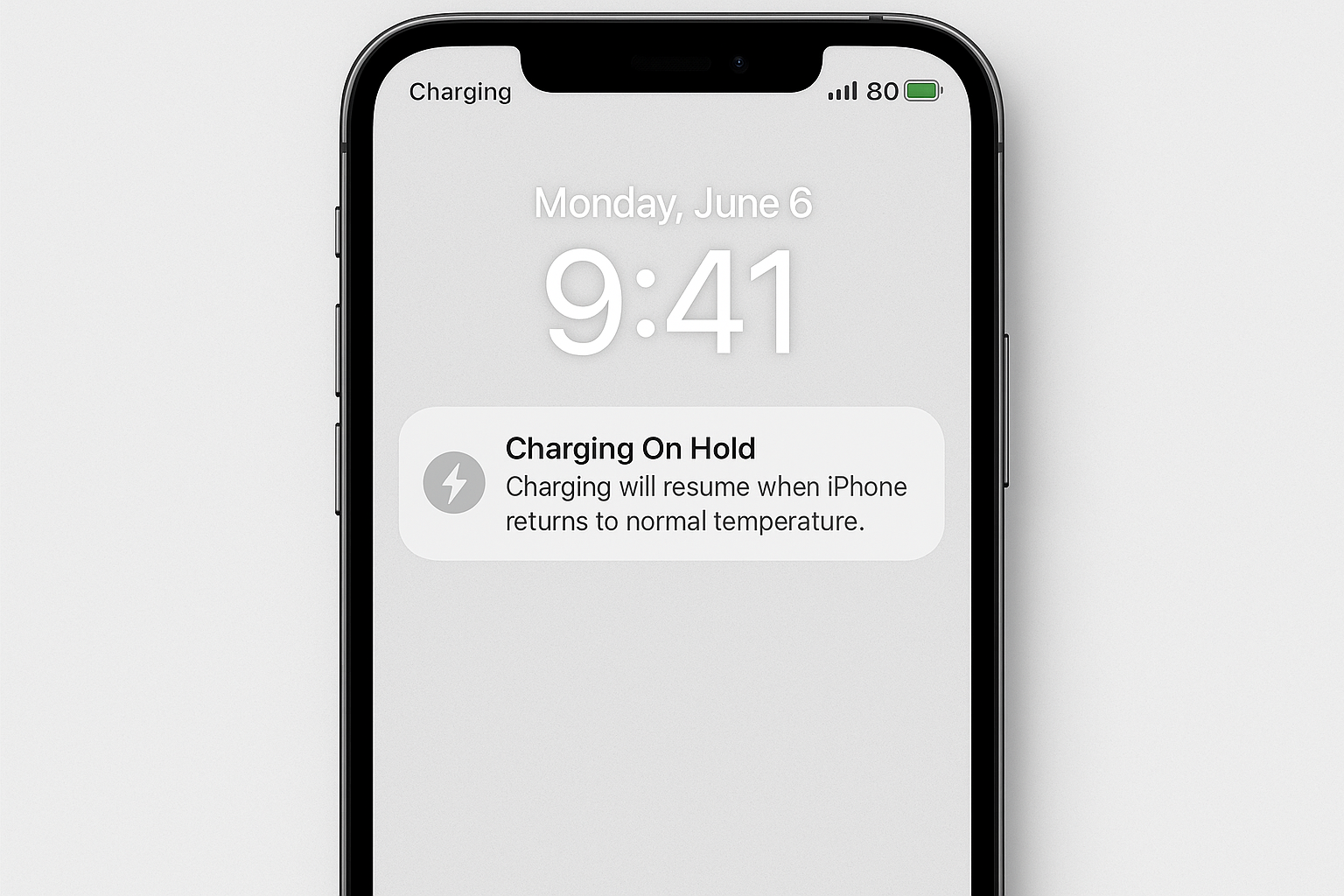 iPhone front display showing battery charging in night stand mode pausing at 80%