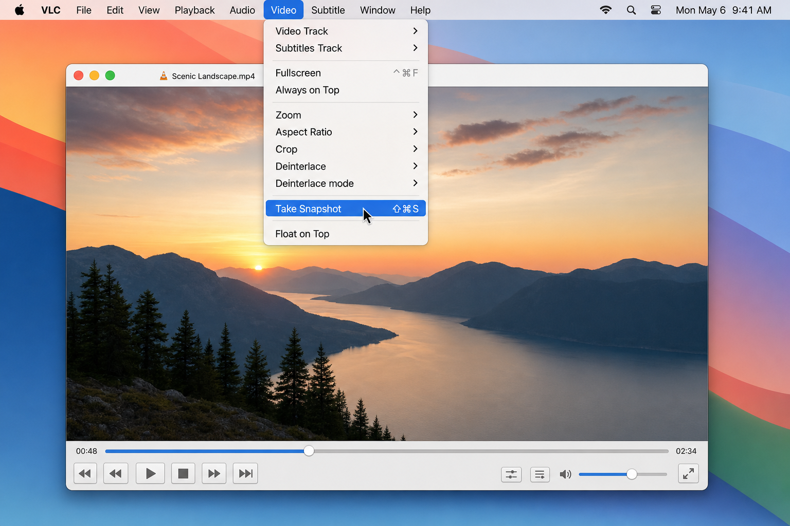 VLC on macOS with Video menu open showing Take Snapshot option