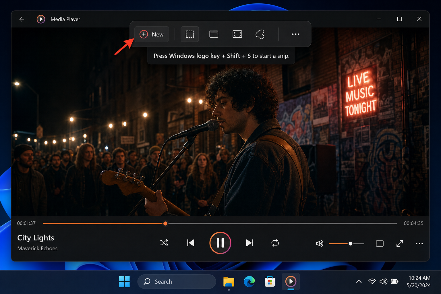 Windows 11 Media Player app with video paused and Snipping Tool overlay active