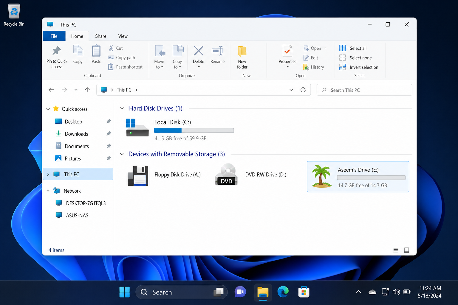 Windows File Explorer showing a USB drive with a custom icon and custom label name instead of the default "Removable Disk" icon