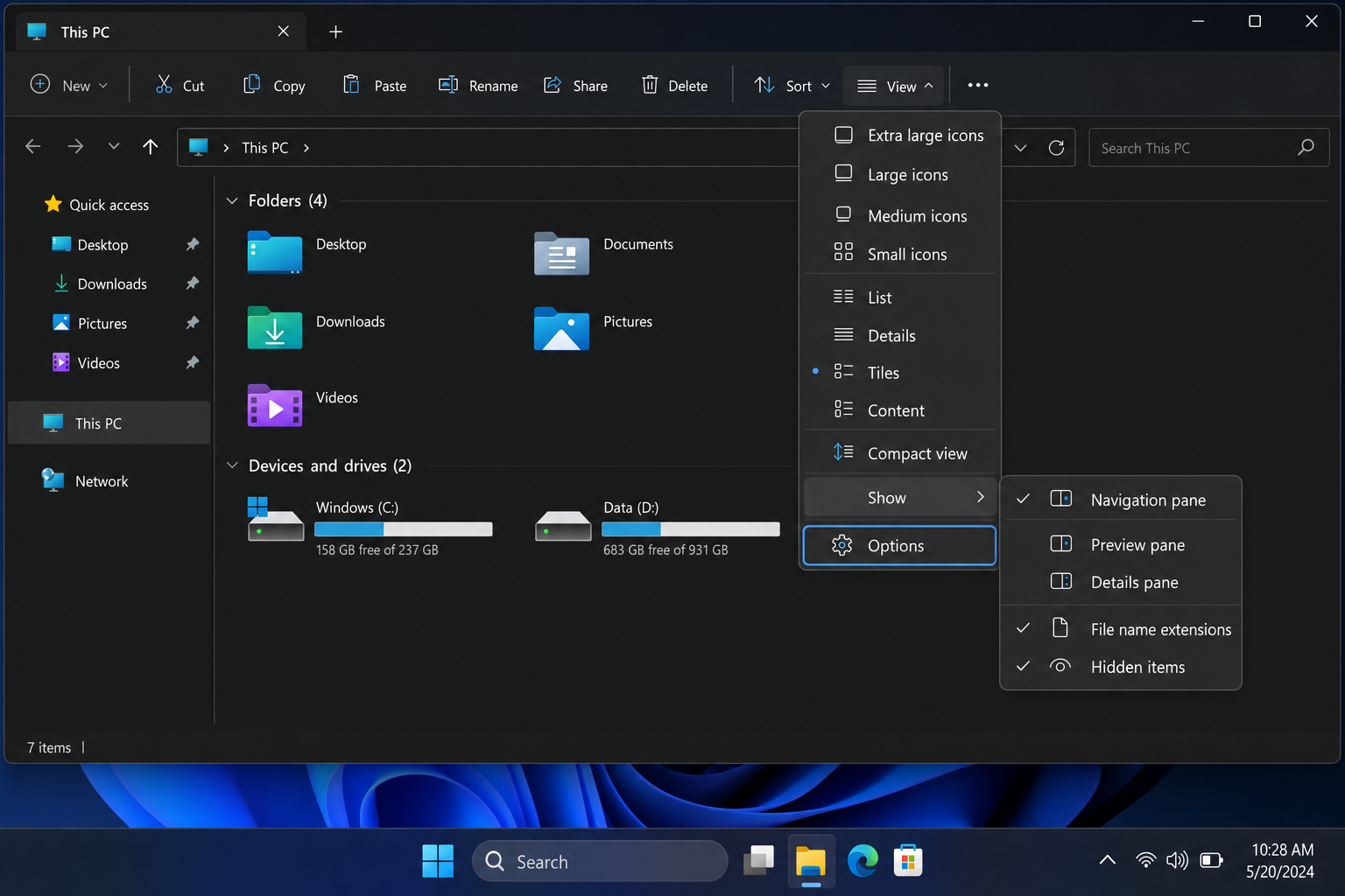 Windows 11 File Explorer with the View menu open and Options button highlighted
