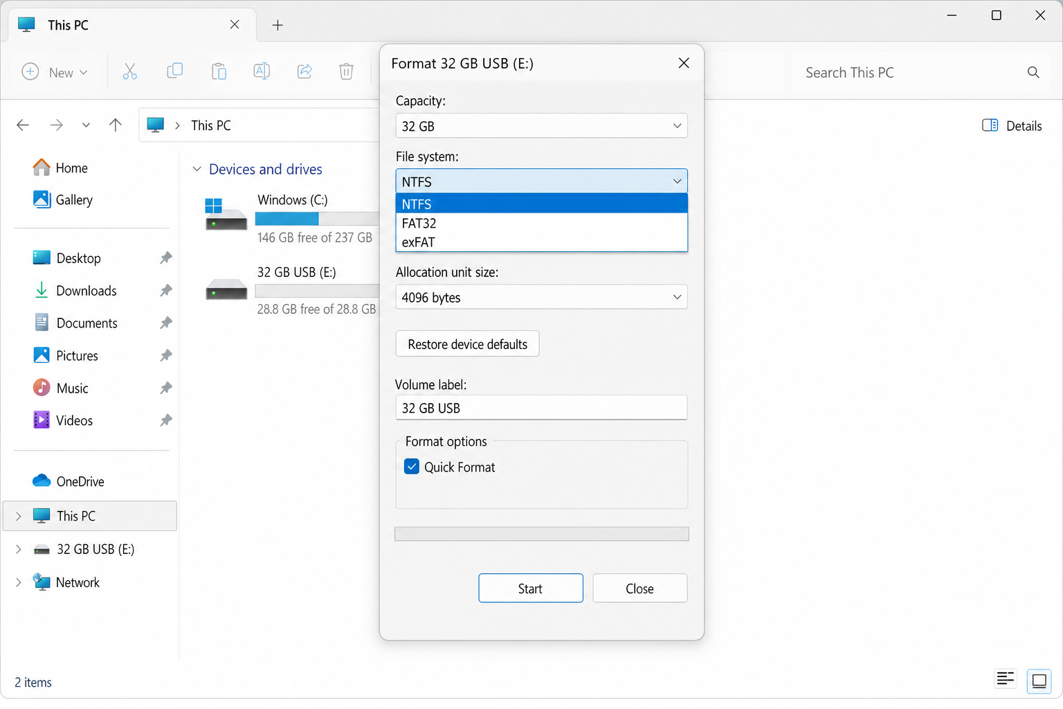 Windows Format dialog box with File system dropdown open showing NTFS selected