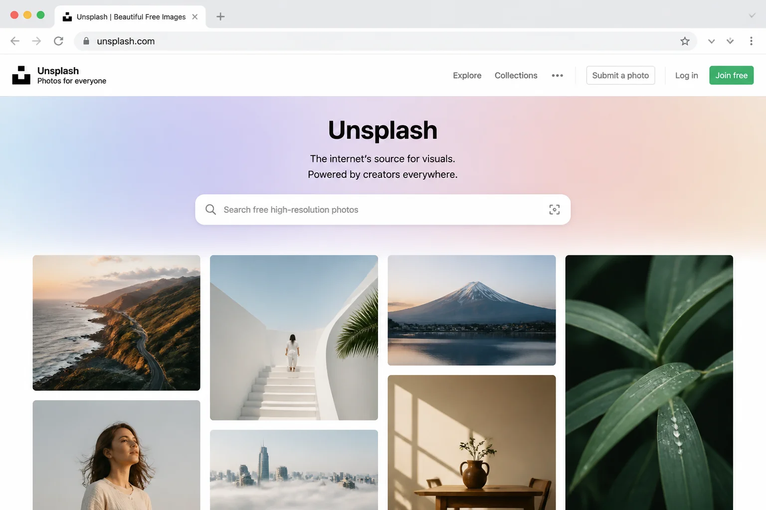 Unsplash homepage showing the search bar and a curated grid of high-quality editorial-style free photos