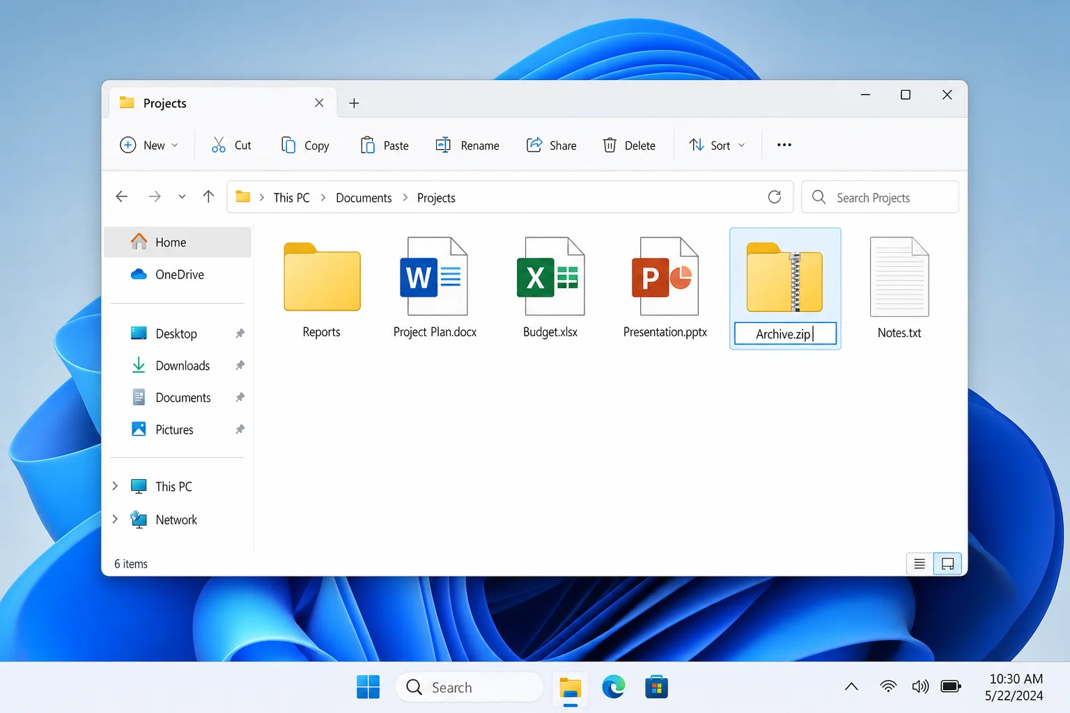 Windows 11 File Explorer showing newly created ZIP file with filename in edit mode