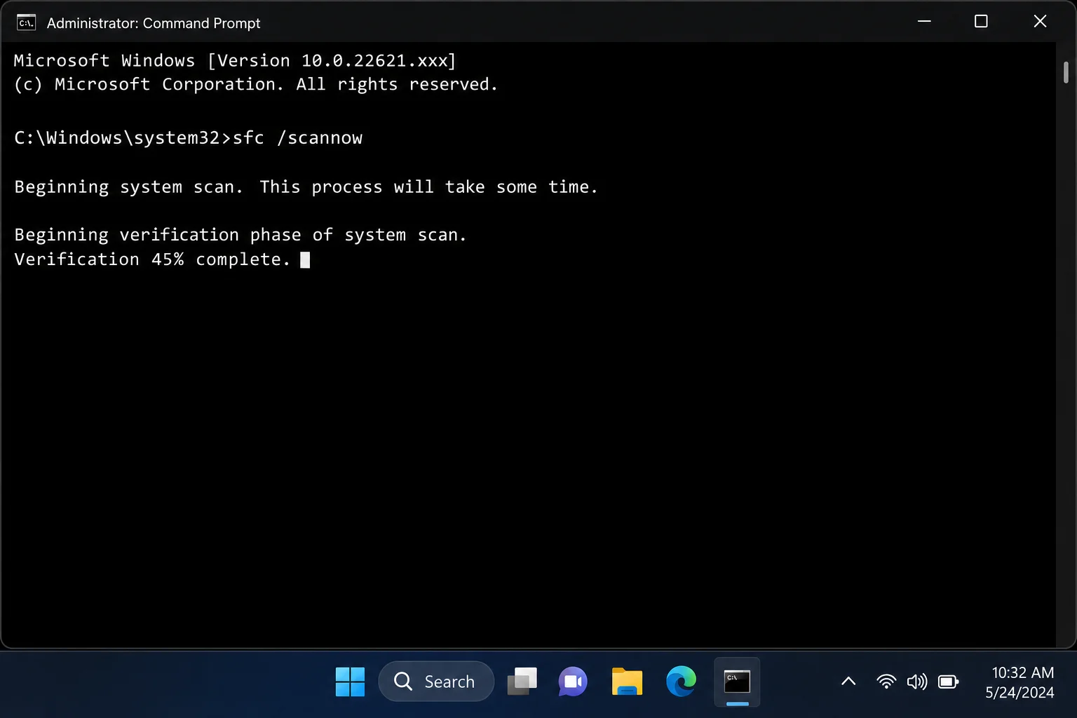 Command Prompt running sfc /scannow with scan progress visible on Windows 11