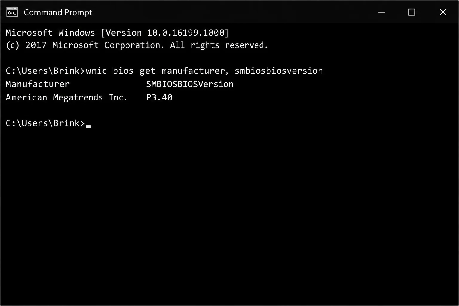 Command Prompt window showing wmic bios get smbiosbiosversion command with version number result