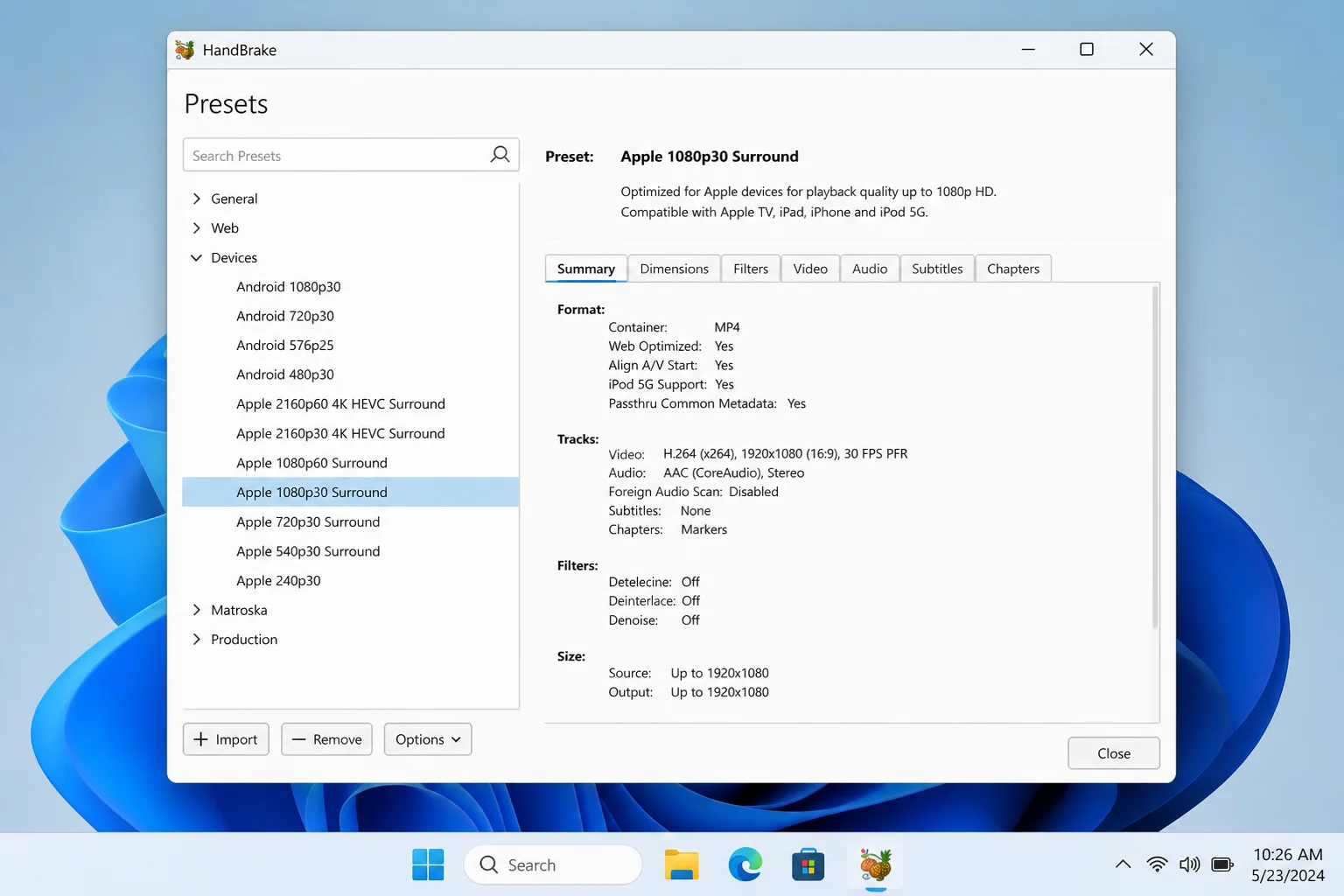 HandBrake Presets panel on Windows 11 (centered taskbar icons, matching the articles other Windows 11 HandBrake screenshots), with the Devices category expanded in the left sidebar and Apple 1080p30 Surround preset selected and highlighted, showing preset details on the right.