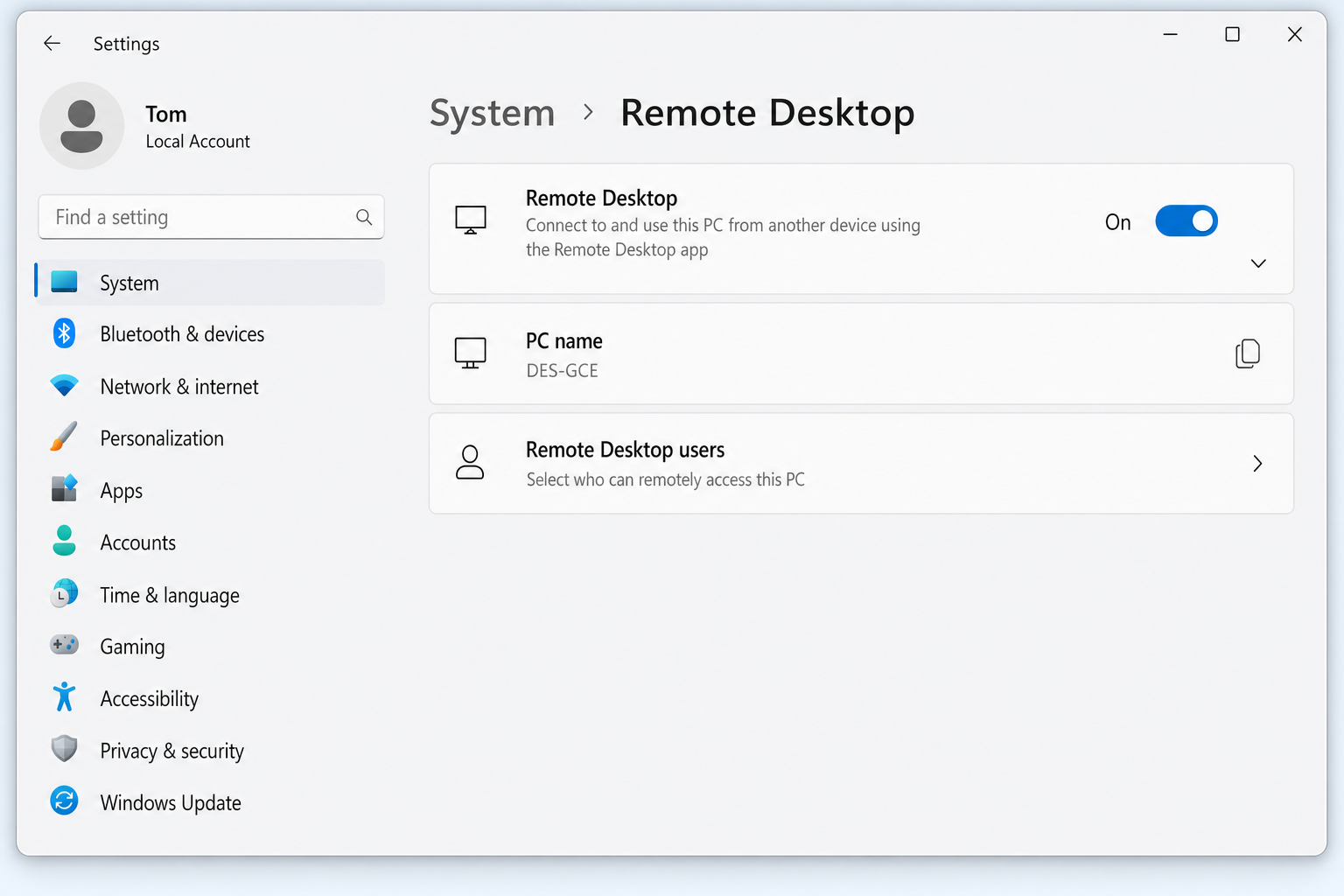 Windows 11 Settings > System > Remote Desktop with the toggle switched On