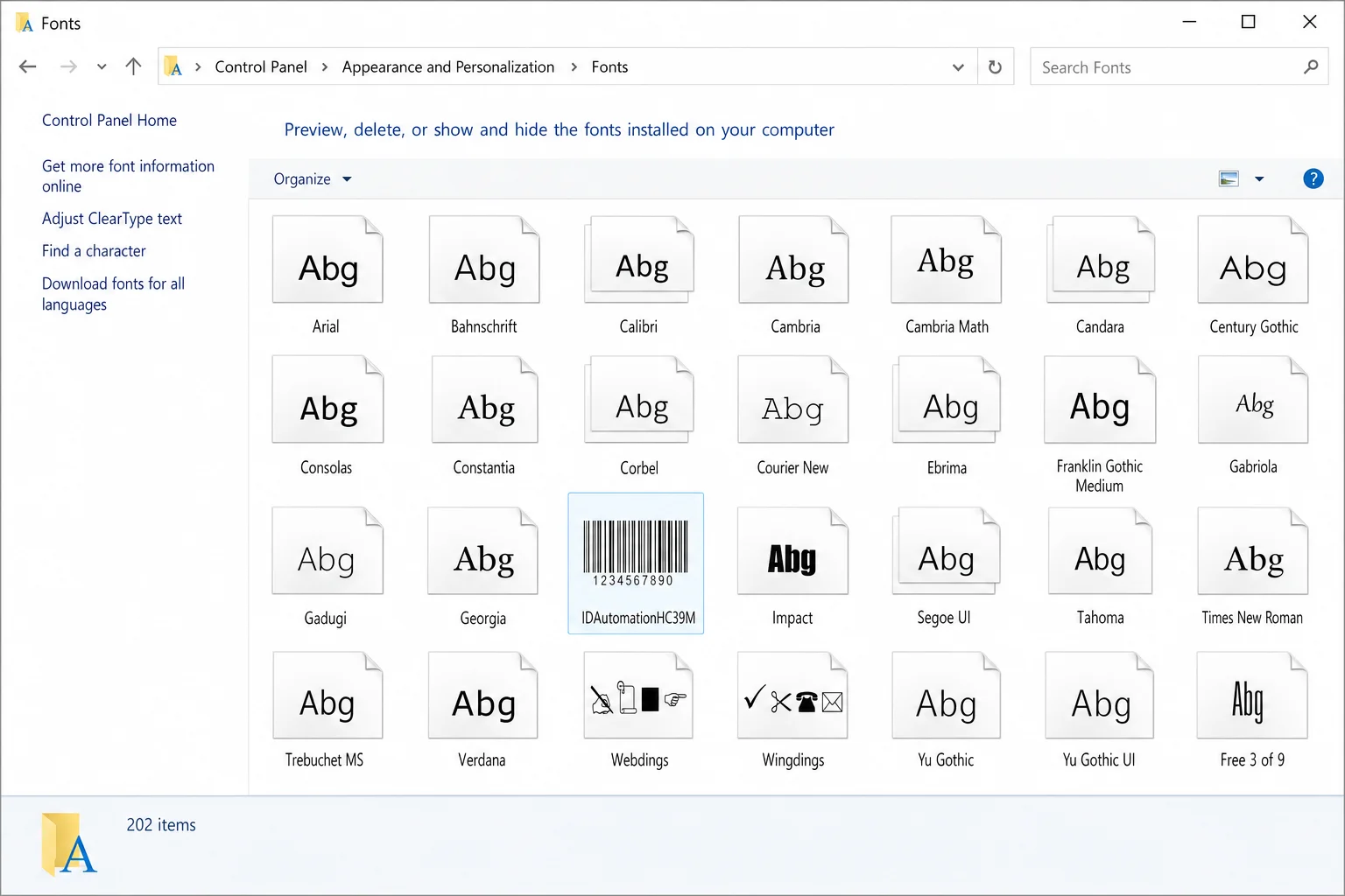 Windows Fonts folder in Control Panel showing a newly installed barcode font in the list