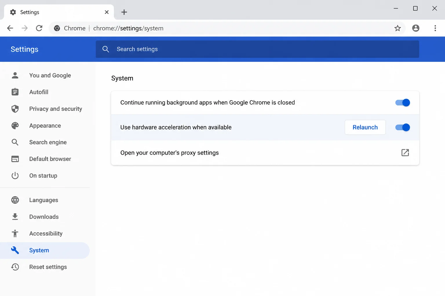 Chrome Settings > System section showing "Use hardware acceleration when available" toggle