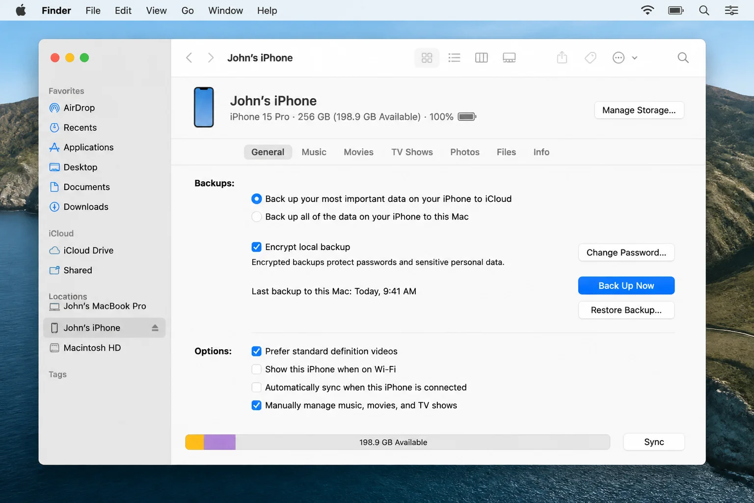 Finder with iPhone selected in sidebar showing Backups section with Encrypt local backup checkbox and Back Up Now button