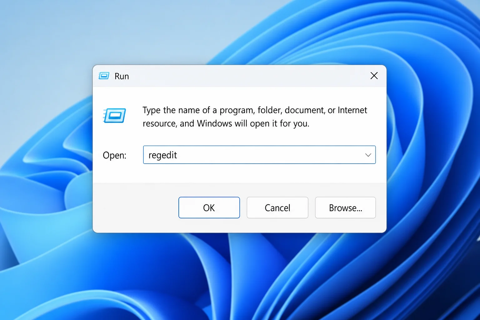 Windows 11 Run dialog with "regedit" typed in the text field