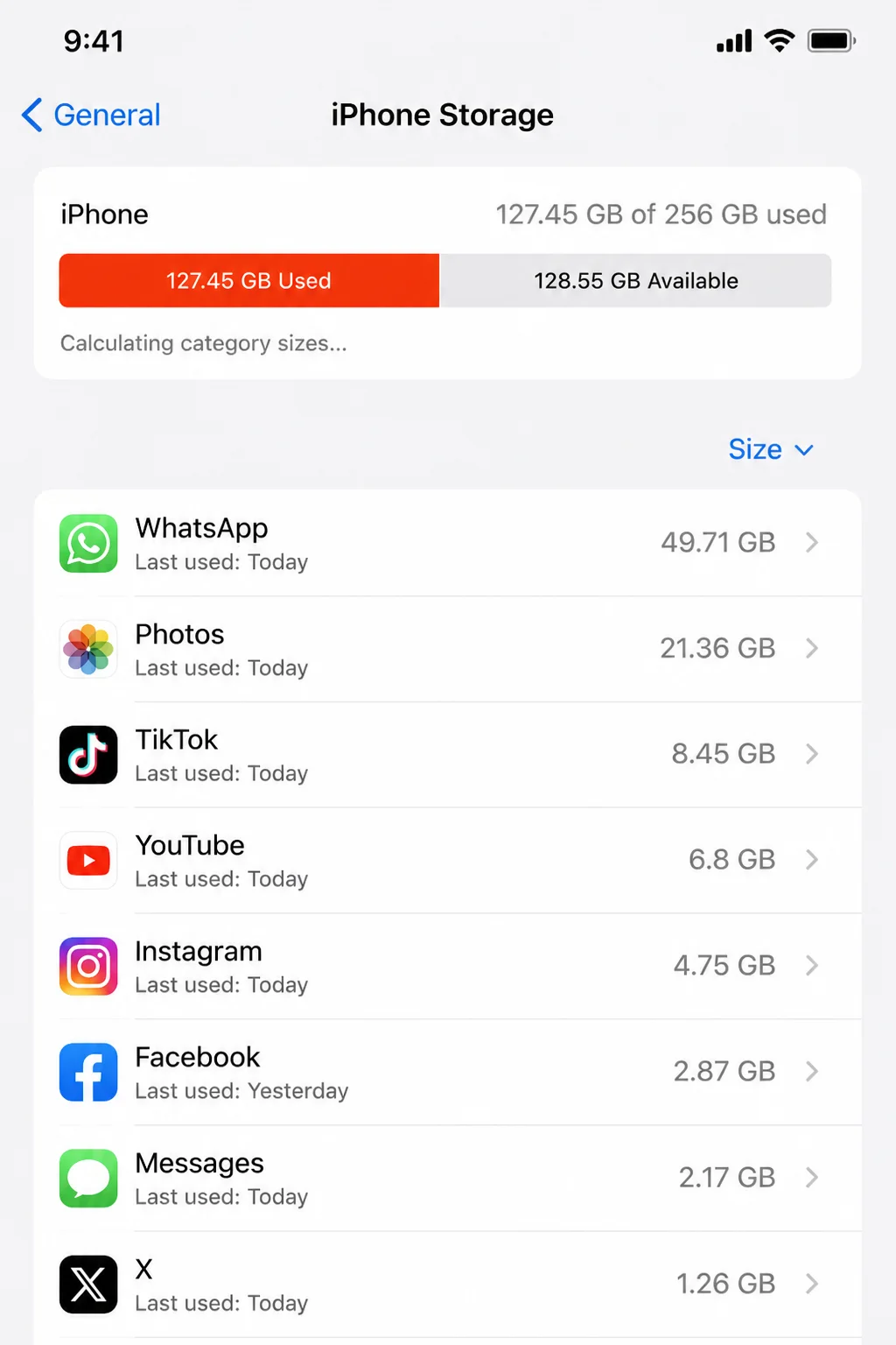 iPhone Storage screen in iOS Settings showing WhatsApp near the top of the app list with its storage size visible
