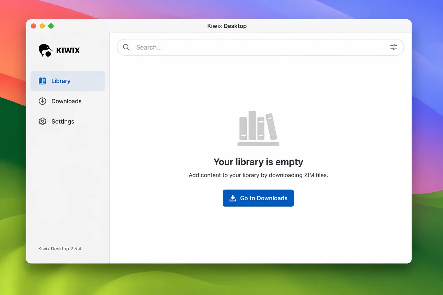 Kiwix Desktop main application window on macOS with an empty or newly loaded library view, showing the search bar and sidebar
