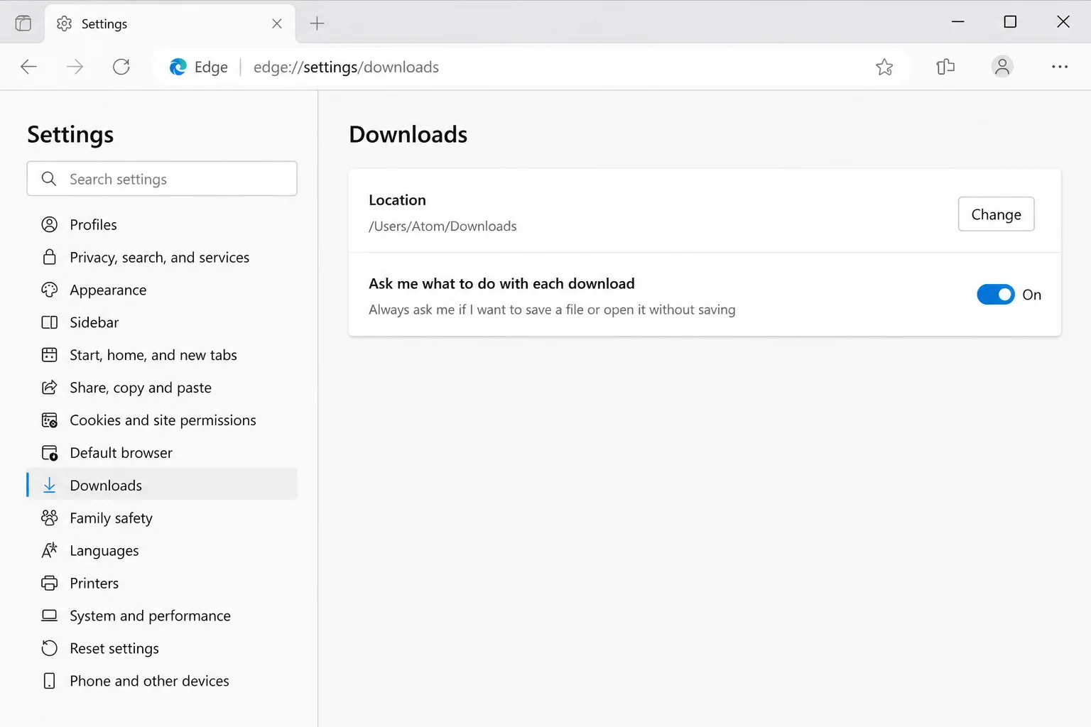 Edge Downloads settings showing Change button next to download location path and Ask me what to do toggle
