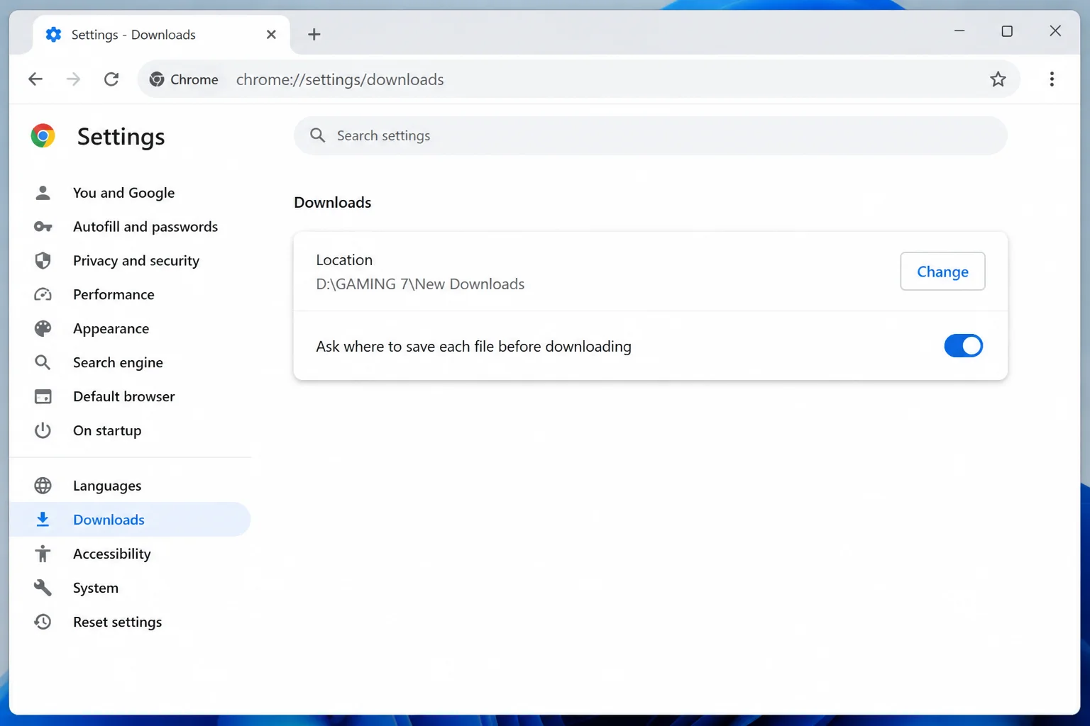 Chrome Downloads settings showing Change button next to folder path and Ask where to save toggle enabled