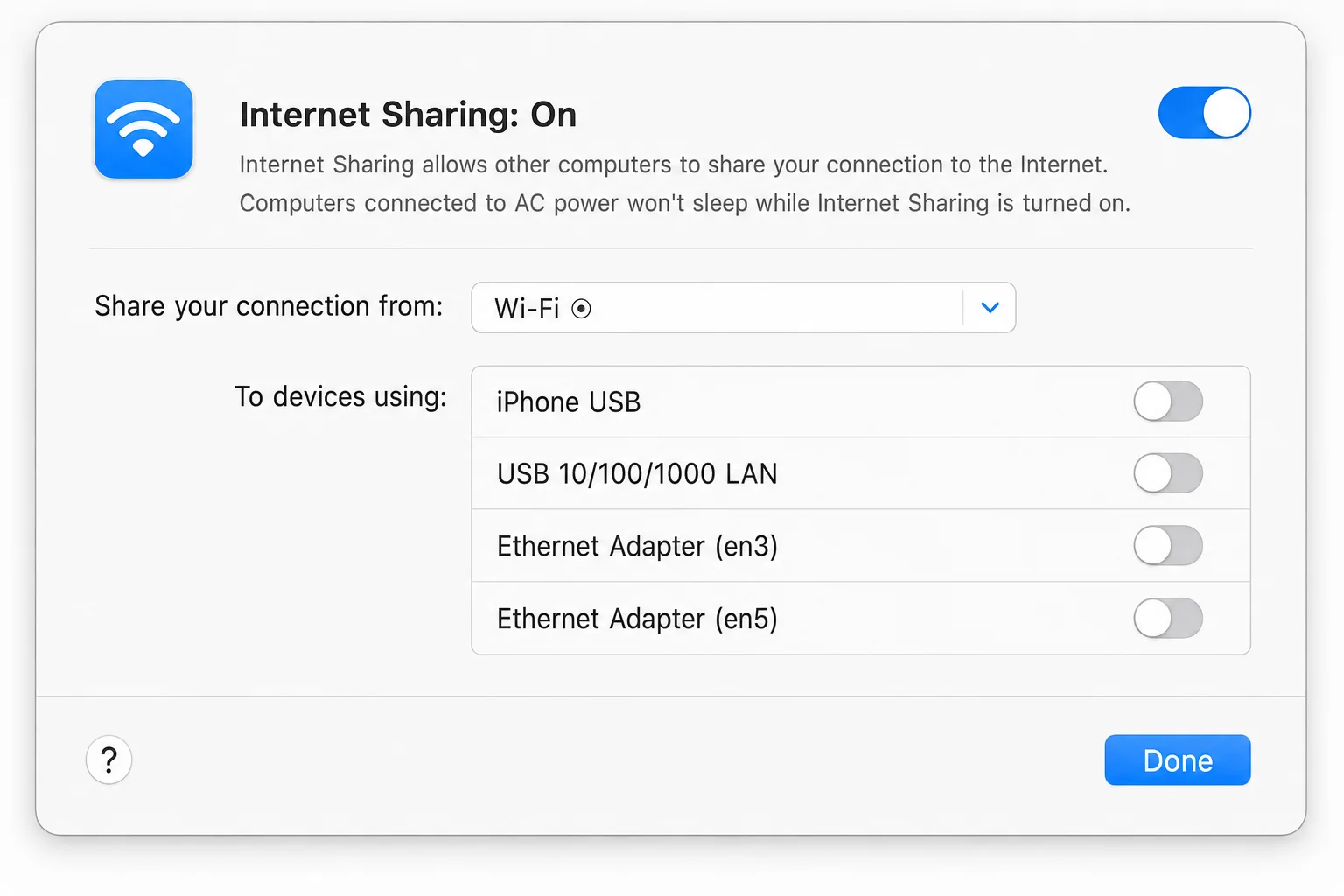 macOS Sharing panel with Internet Sharing checkbox enabled and status showing active