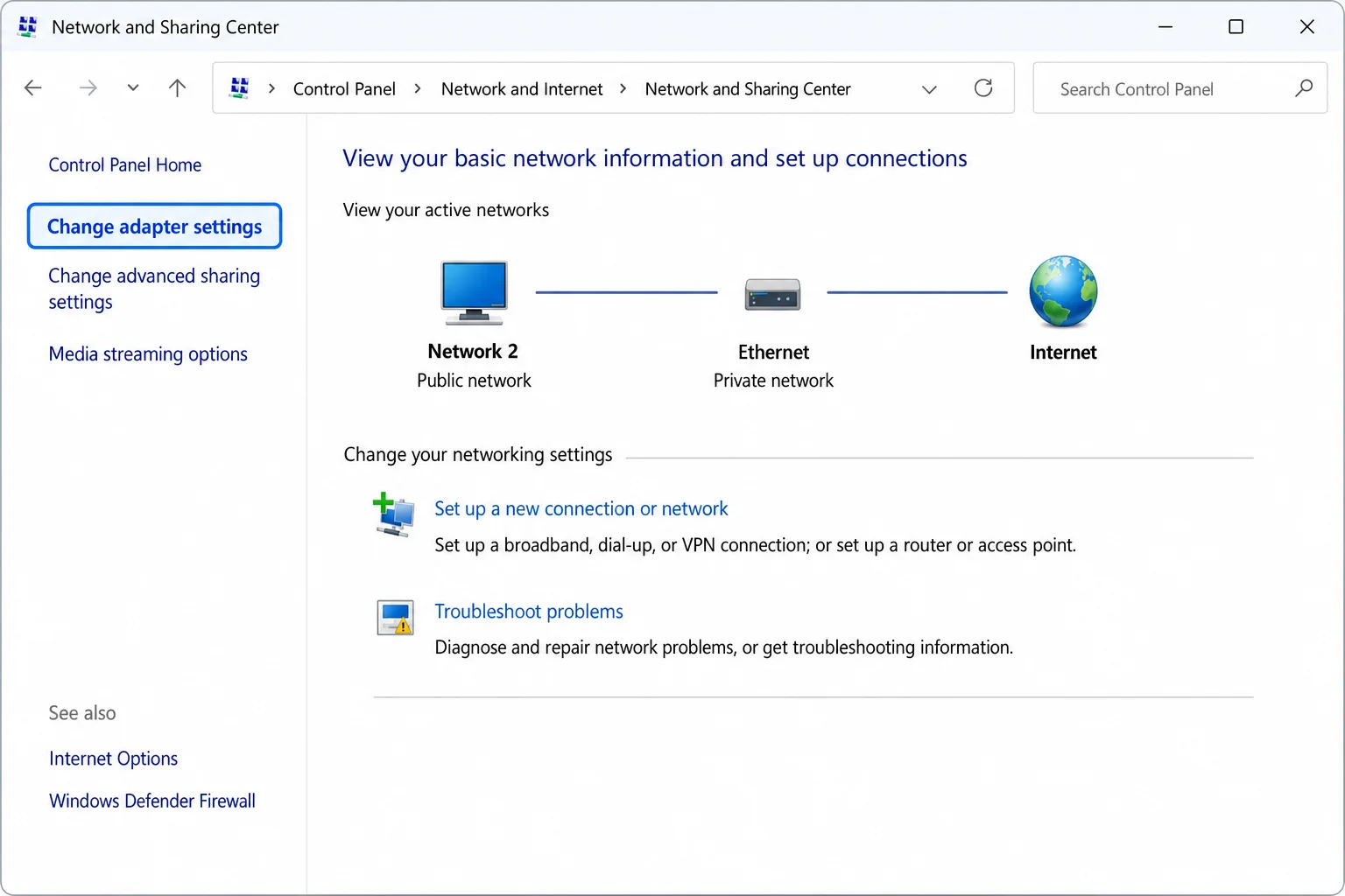 Windows 11 Control Panel showing Network and Sharing Center with Change adapter settings link highlighted