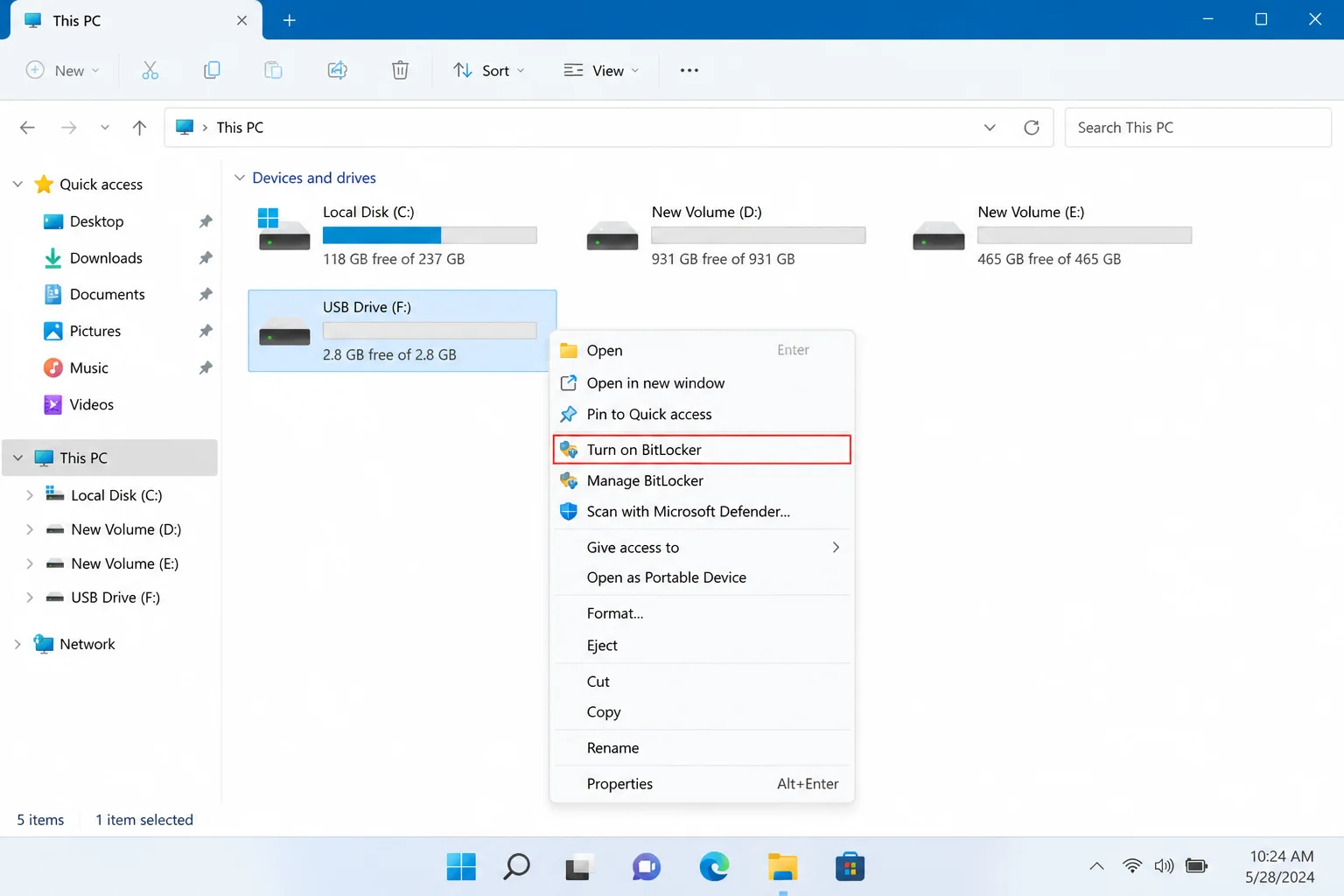 Windows 11 File Explorer showing the right-click context menu on a connected USB drive with "Turn on BitLocker" highlighted