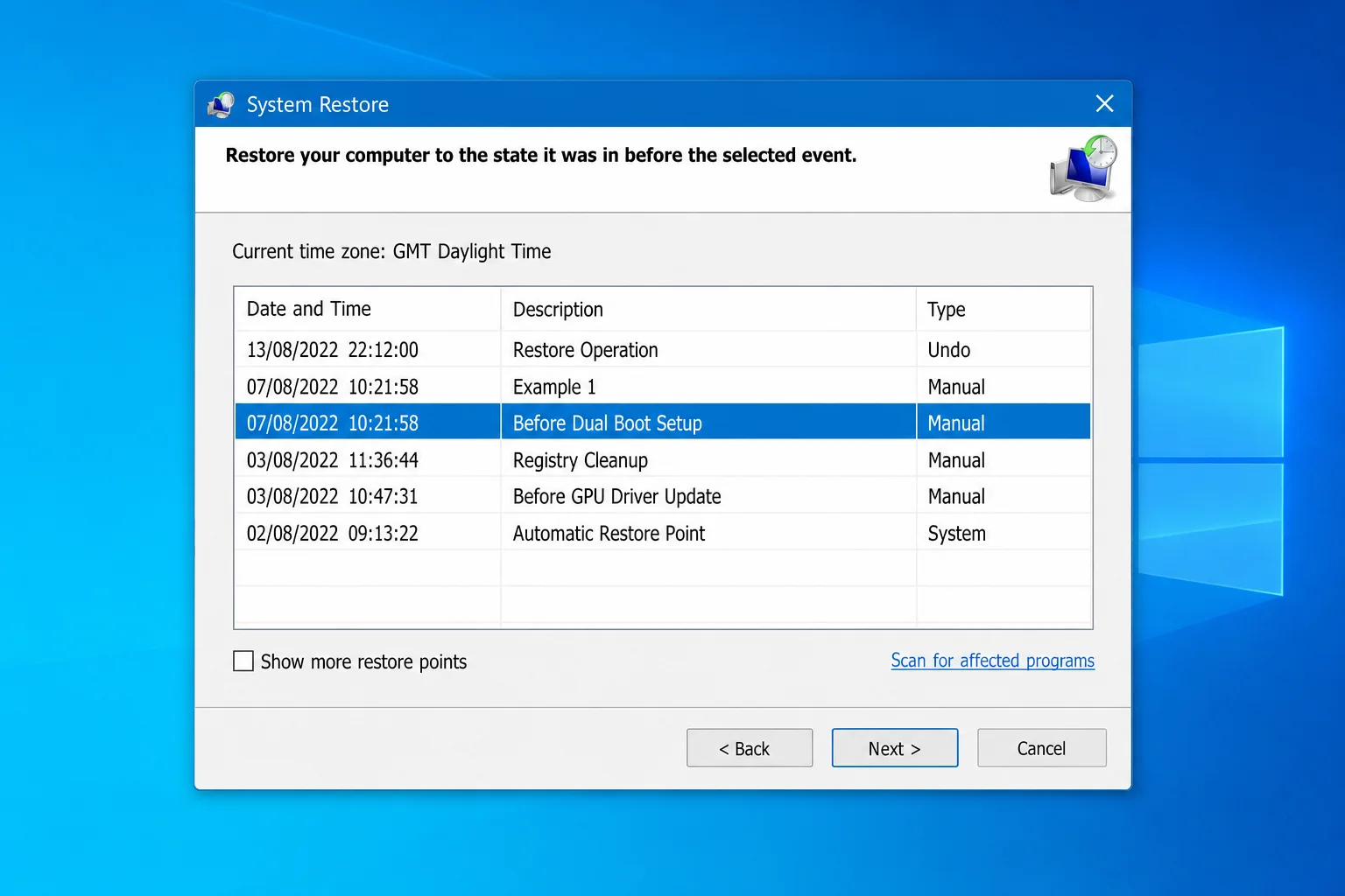 System Restore window showing a list of restore points with columns for Date and Time, Description, and Type — including both Manual and System entries