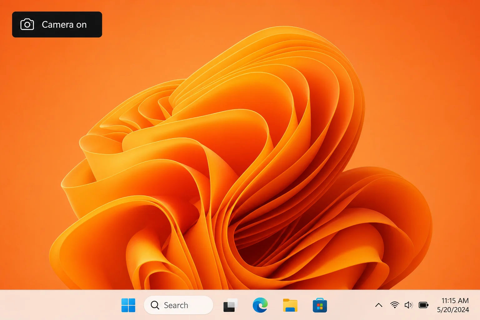 Windows desktop showing a Camera On OSD notification appearing in the top-left corner of the screen