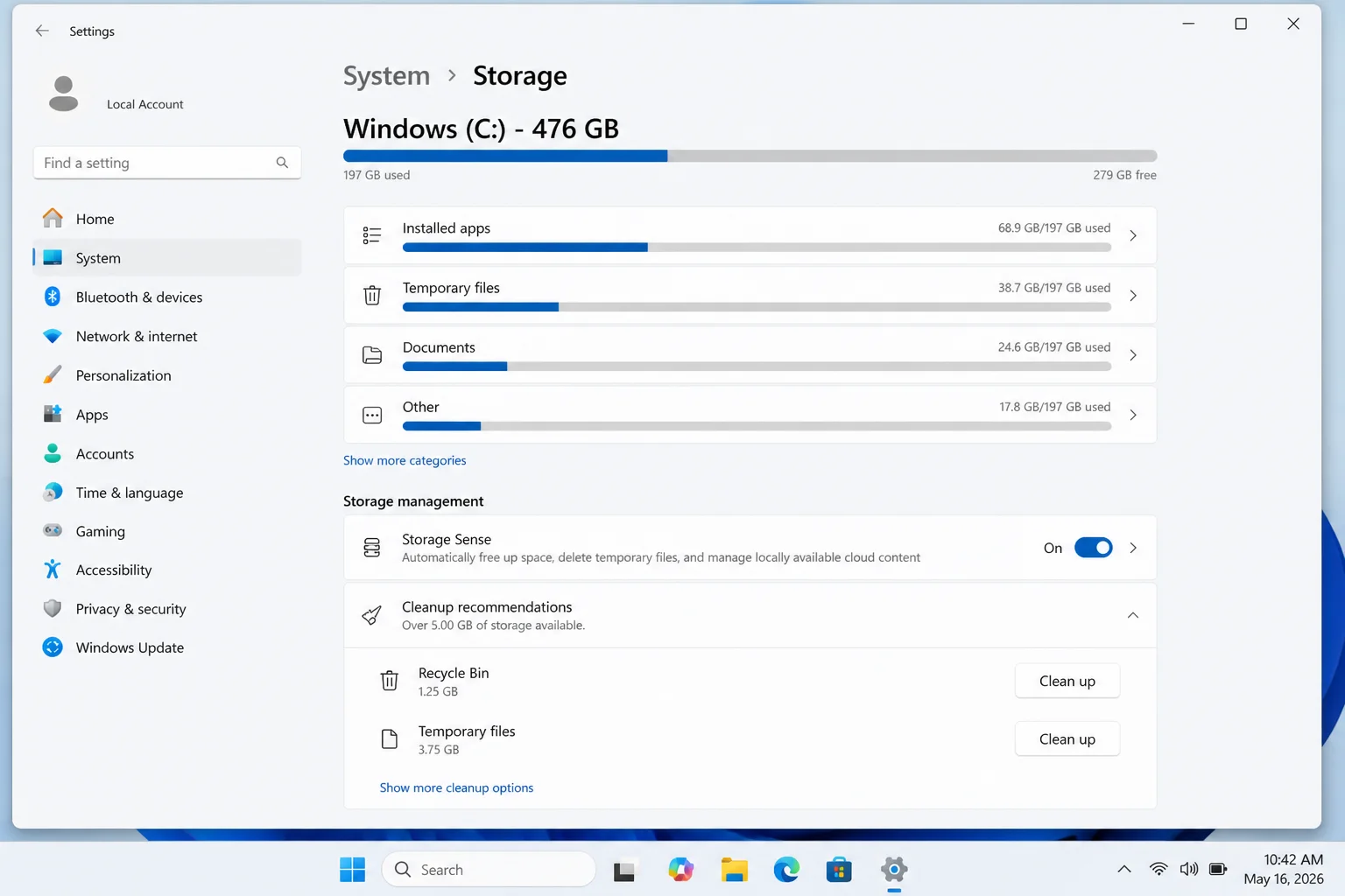 Windows 11 Settings > System > Storage page showing storage breakdown and cleanup recommendations