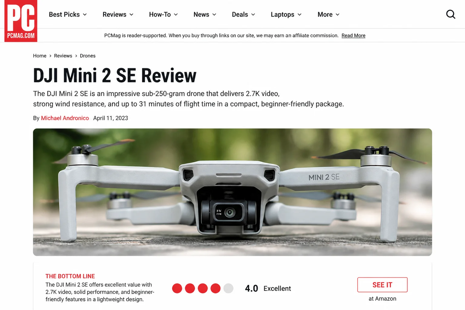 DJI Mini 2 drone from a front-low angle showing the 3-axis gimbal and camera module
