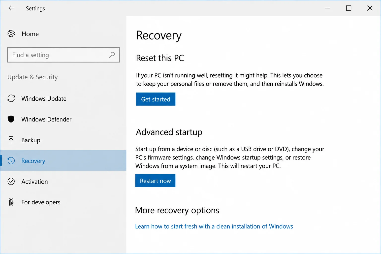 Windows 10 Update & Security settings with Recovery selected in the left sidebar