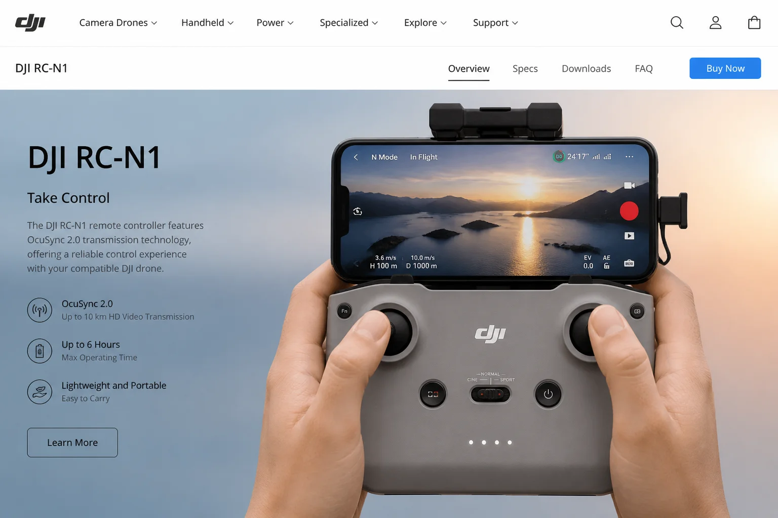 DJI Mini 2 RC-N1 remote controller with phone mounted in the grip holder, held in two hands