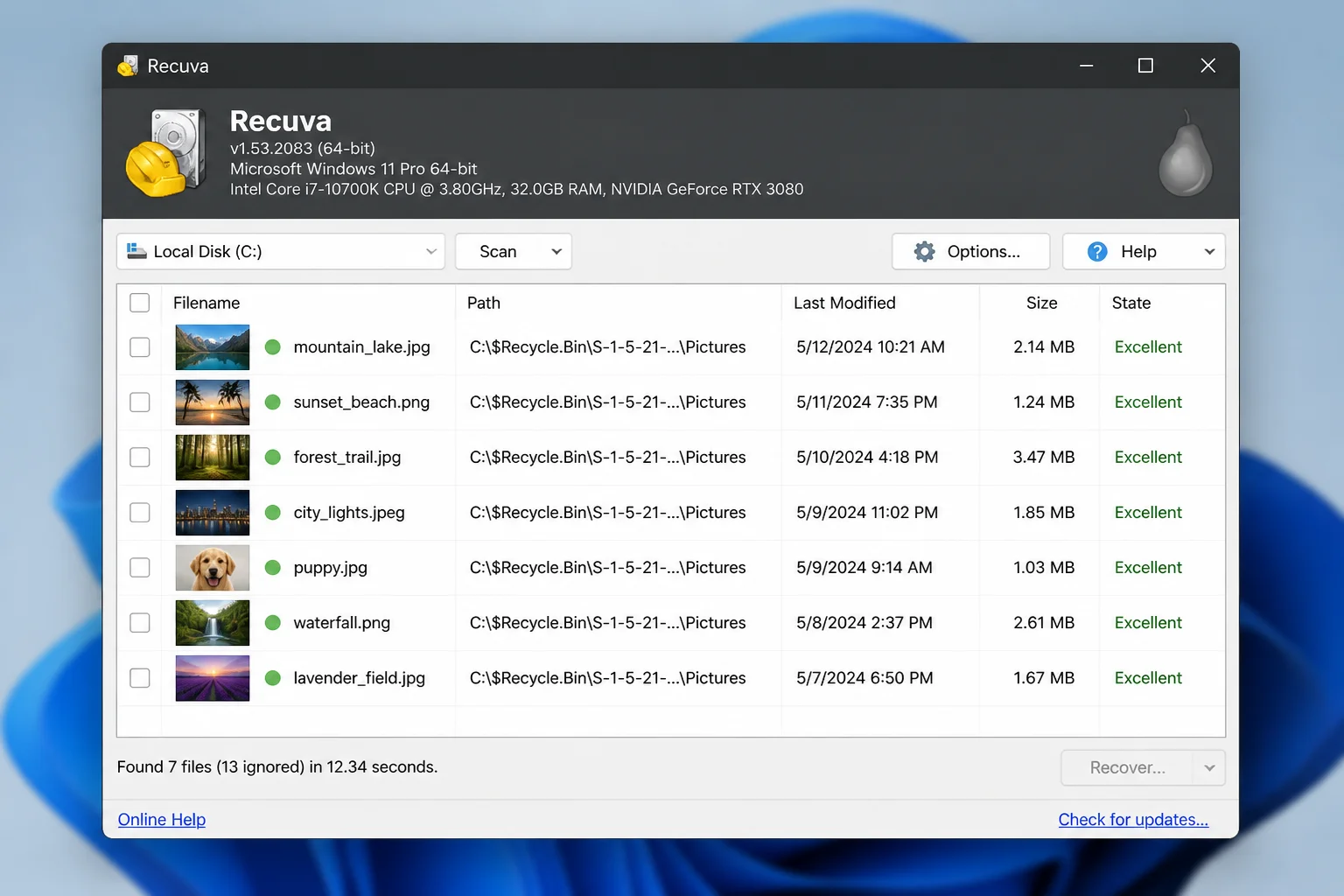 Recuva main window showing recovered file list with photo thumbnails and color-coded recovery status indicators