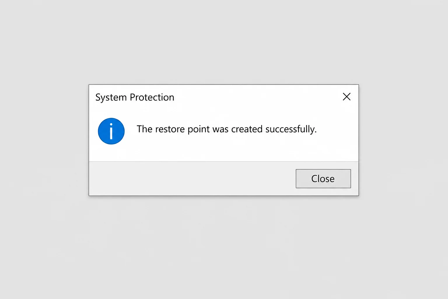 Success confirmation dialog reading "The restore point was created successfully" with the Close button visible