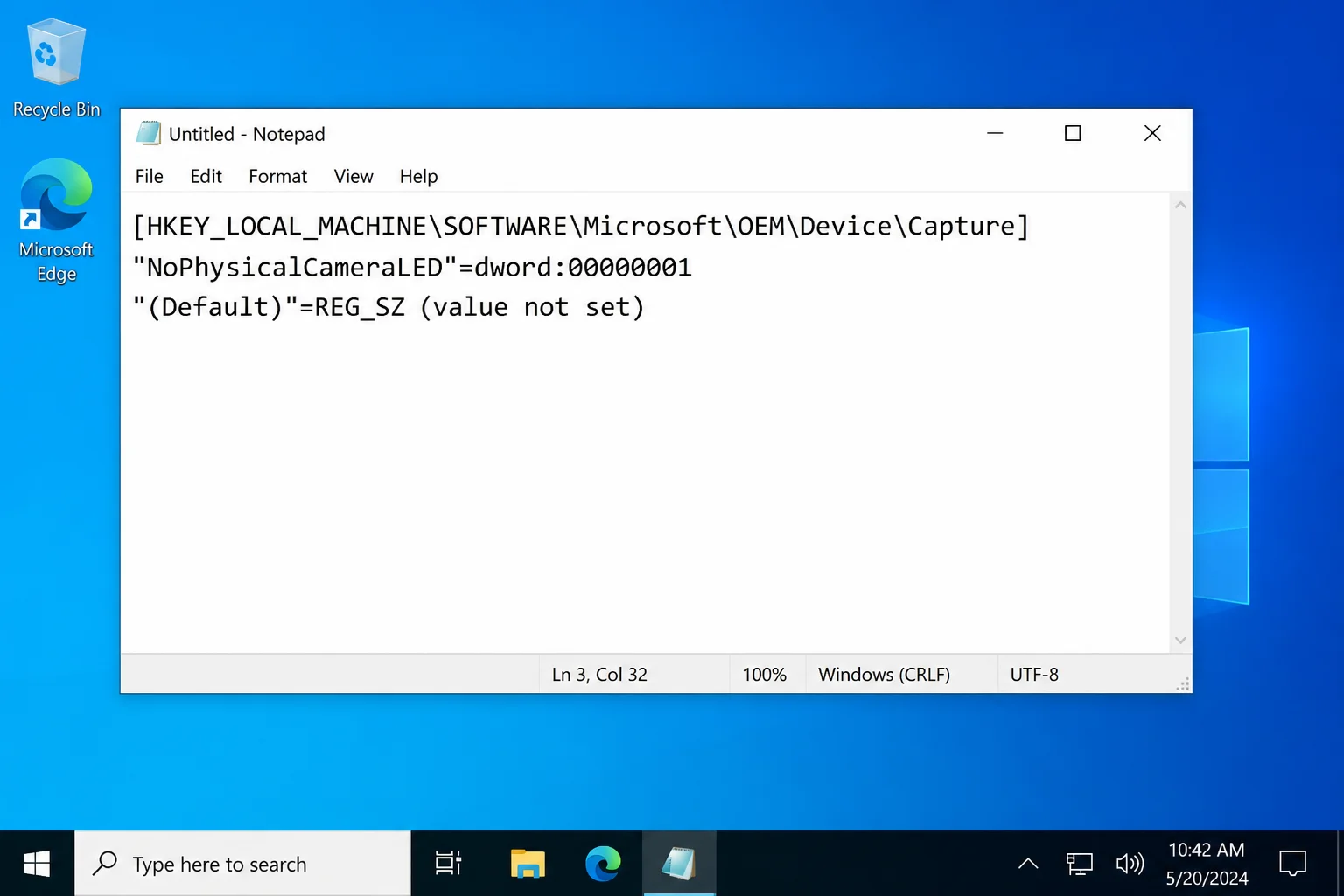 Notepad window containing the registry file text for enabling the NoPhysicalCameraLED value, with all three lines visible