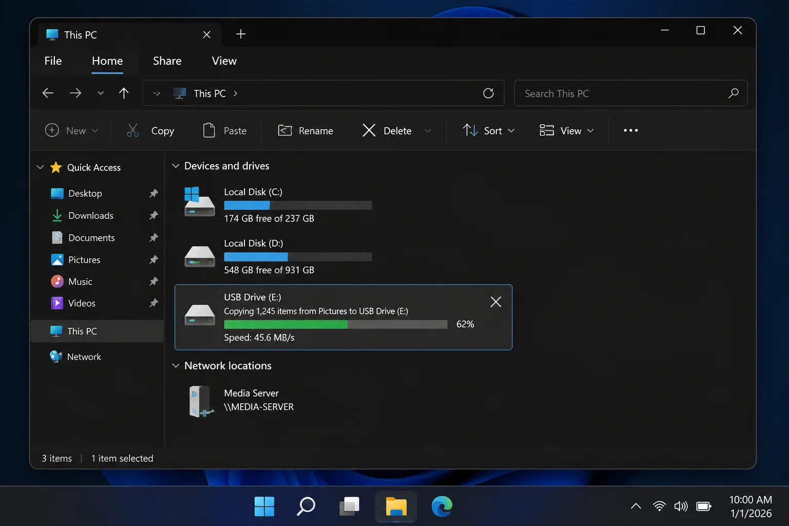 Windows 11 File Explorer showing a USB flash drive listed under This PC with files being copied