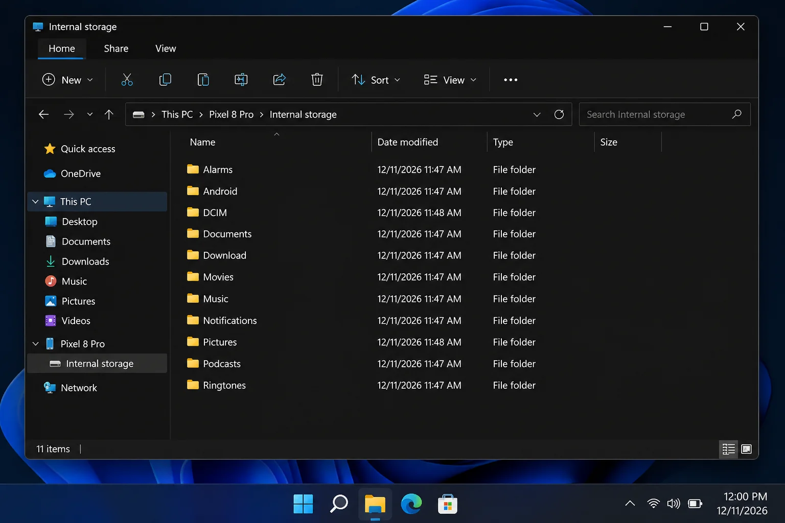 Windows 11 File Explorer showing an Android phone listed under This PC with internal storage folders visible